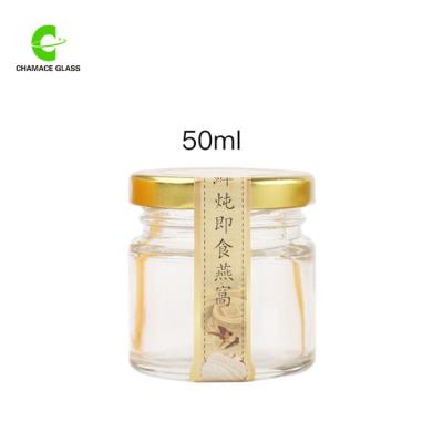 China Honey 35ml 50ml Round Glass Jars, Mini Favor Jars For Sale for sale