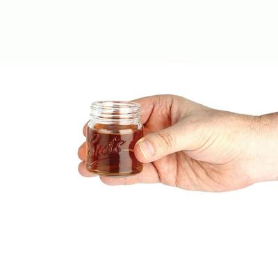 China Freshness Conservation 50ml Mason Jar Shot Glasses Mini Mason Jar Shot Glass With Cap for sale