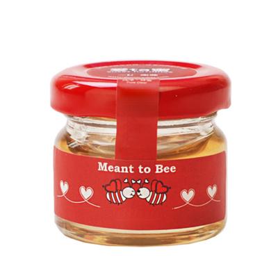 China Eco-Friendly Small 1 Ounce Jelly Jar 35ml Honey Jar Glass With Twist Off Lids for sale