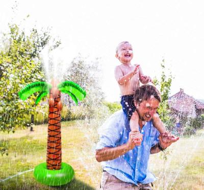 China PVC Customized Inflatable Shape Kids Coconut Tree Protection Outdoor Parent-Child Water Spray Pad for sale