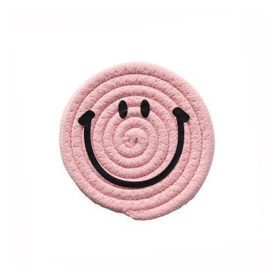 China Sustainable And Beautiful Korean Newcomer Smile Insulation Single Face Table Coaster Woven Cotton Insulation Pad for sale