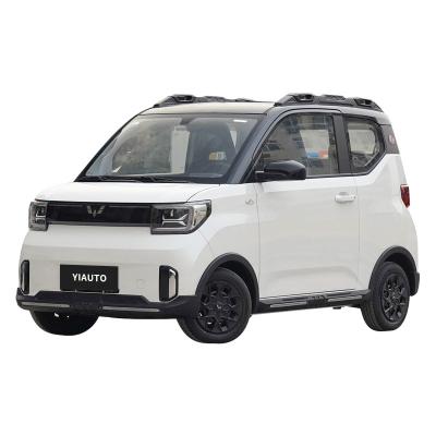 China The new 2022 fabric model 330 km range mini mini EV 4 seats cheap hot sale WULING HONGGUANG left hand drive wuling mini ev electric car for sale