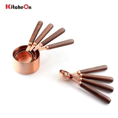 China Latest New Viable Antique 8 Piece Copper Plating Stainless Steel Measuring Cups And Spoons Set With Wooden Handle for sale