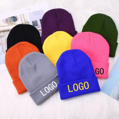 China COMMON Wholesale Custom Logo Embroider Logo Caps Wide Design Knit Cheap Beanie Hats For Women for sale