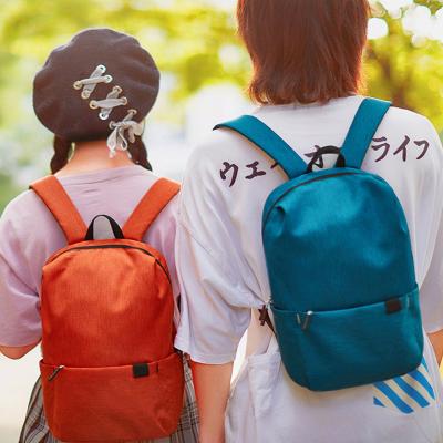 China Ultra Light Anti-theft Canvas Backpack Color Outdoor Travel Backpack For Men And Women for sale