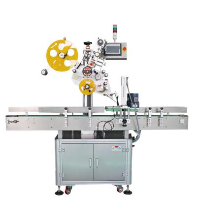 China Plastic Top Outdoor Beverage Clothing Bags Labeling Machine For Clothes Package for sale