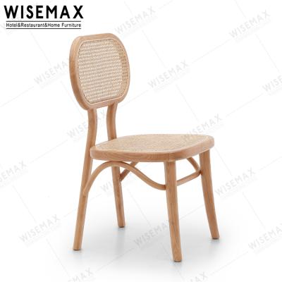 China Nordic WISEMAX FURNITURE Latest Cherry Color Chair Wood Wicker Wedding Chair Rattan Dining Chair for sale