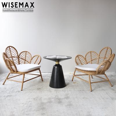 China Import classic and modern single design flower shape FURNITURE WISEMAX natural rattan balcony leisure sofa chair for sale