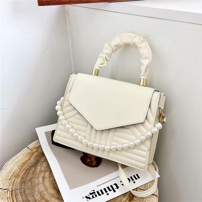 China 2022 Bag Personality Pearl Handbag Candy Color Women Fashion Simple Square Small New Retro Shoulder Messenger Bag for sale