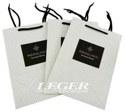 China Paper Shopping Bags With Cotton Handles For Skin Care Products Packaging for sale