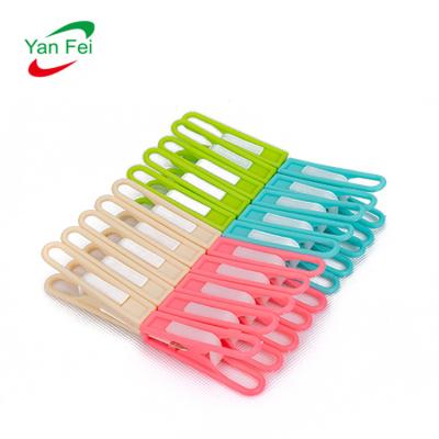 China Minimalist plastic clothespins and wholesale cheap laundry fabric peg plastic manufactures clothespins for clothes for sale