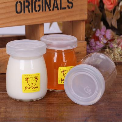 China Hot Sale 100ml Empty Clear Yogurt Milk Glass Pudding Food Jar Jar Container Glass Pudding Bottle With Lid for sale