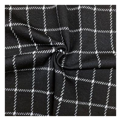 China Custom Plaid Pattern Polyester Spandex Jacquard Knitted Fabric Garment Soft Fabric Te koop