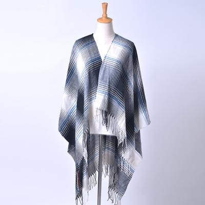 China Fashion Ladies Winter Soft Smooth Feeling Poncho, Ombre Plaid Ruana Woven Warm Winter Women Poncho With Tassels for sale