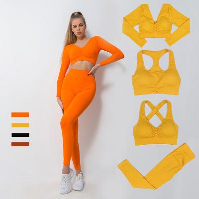 China Antibacterial Tik Tok 4 Piece Gym Bra Suit Sports Active Fitness Plus Size Long Sleeve Fitness Tracksuit Women Sport Yoga Seamless Set for sale