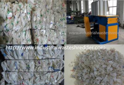 China Große Kapazitäts-Plastikflaschen-Zerkleinerungsmaschinen-Maschine, doppelter Wellen-Schrott-Glasflaschen-Reißwolf zu verkaufen