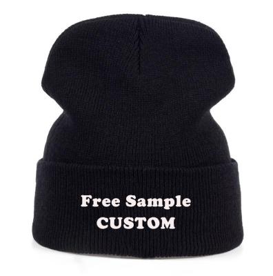 China COMMON 100% Acrylic Woven Label Cuff Winter Hat Custom Knitted Beanie for sale