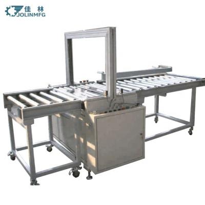 China High Productivity Plastic Tie Semi Automatic Carton Tying Machine For Commodity for sale