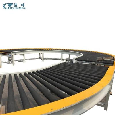 China JOLINMFG Oil Resistant Carbon Steel 90 Degree 180 Degree Turning Curved Rubber Roller Conveyor for sale