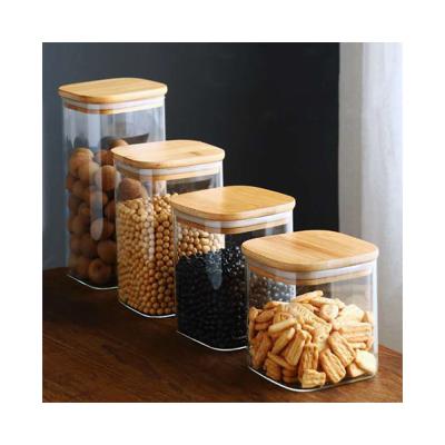 China Borosilicate Glass Sustainable Square Jar With Lid Bamboo Food Sealed Storage Jar for sale