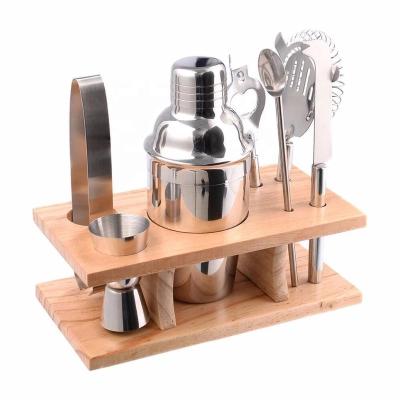 China Viable Wholesale Bartender Kit Cocktail Shaker Set Bartender Tool Accessories Wooden Stand Base Tumbler 12 Pcs Stainless Steel for sale