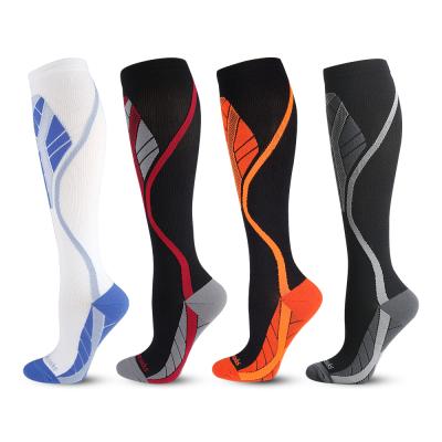 China New Sports Custom Design Basketball Compression Sports Socks Custom Made Knee High Sports Socks With Logo for sale