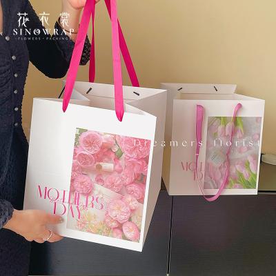 China Recycled Materials SINOWRAP Florist Supply And Materials Wholesale Kraft Paper Bag Flower Bouquet Packaging Bag for sale