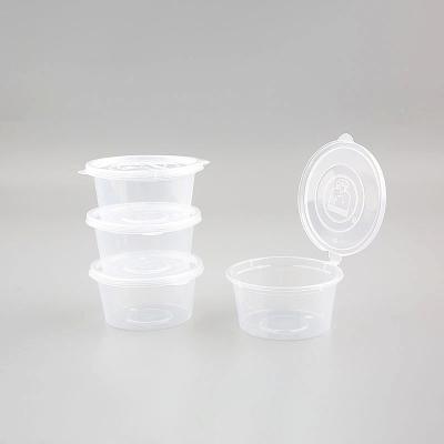 China Disposable Restaurant Single-Serving Gravy Cup Takeout Plastic Seasoning Container With A 1 Oz Lid for sale