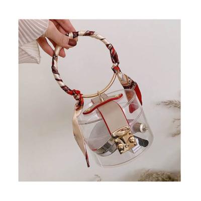 China Fashion Jelly Evening Handbags PVC Barrel Shaped Women Around Metal Handle Transparent Shoulder Bag Mini Clear Small Clutch Bag for sale