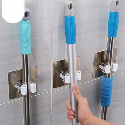 China Adhesive Wall Mounted Household Broom Holder Mop Hanger Broom Hanger Adhesive Hook Racks Kitchen Bathroom Organizer L0392 for sale