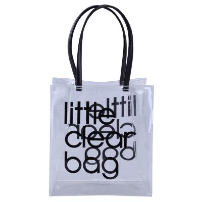 China Shiny Fashion Durable PVC Hand Shopping Tote Bag Little Clear Bag for sale