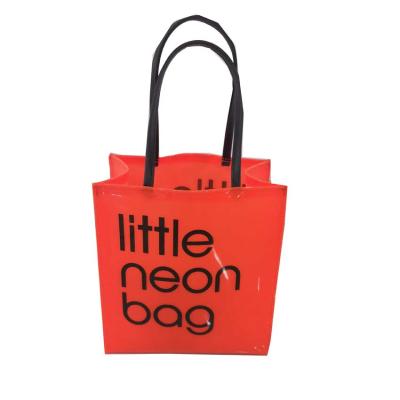 China Fashion Durable Little Neon Bag Shining PVC Hand Shopping Tote Bag for sale