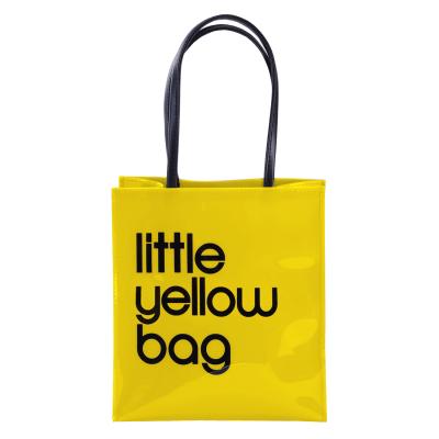 China Fashionable Durable Little Yellow Bag Glossy PVC Hand Shopping Tote Bag for sale