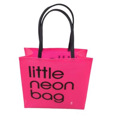 China Fashionable Waterproof Durable Shiny PVC Hand Shopping Tote Bag Little Neon Bag In Pink Color for sale