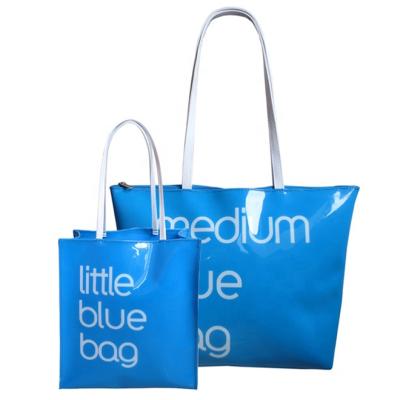 China Durable Fashion PVC Design Customized Glossy Printed Tote Bag For Women for sale