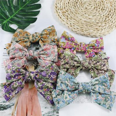 China Wholesale fashion sweet temperament bow spring clip hairpin ladies headdress floral small for sale