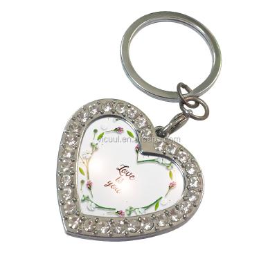 China Beautiful Metal Heart Picture Frame Key Chain Inlaid Crystal Zinc Alloy Key Chain for sale