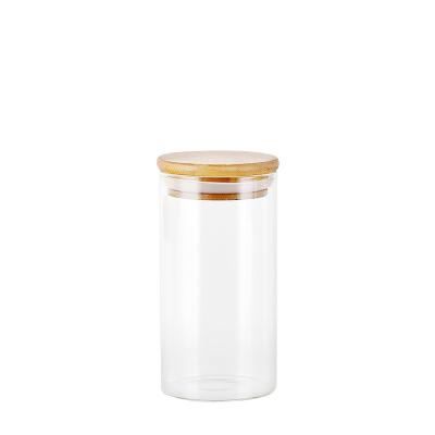 China Storage Products Clear Cylinder Containers With Wooden Bamboo Lid High Borosilicate Glass Food Storage Jars Glass Bottle Storage Jar Packaging Cu for sale