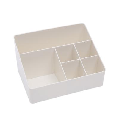 China Multi-cell stationery storage box single viable cosmetic desktop dressing table K plastic stationery storage box for sale