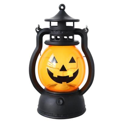 China Halloween Ornaments Decoration Pumpkin Transitional Lantern with LED Light Pumpkin Candle Holder Table Figurine for sale