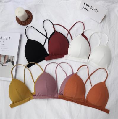 China QUICK DRY Korean version of beauty rib straps cross back triangle strapless cup gathered button bra girl underwear front bra for sale