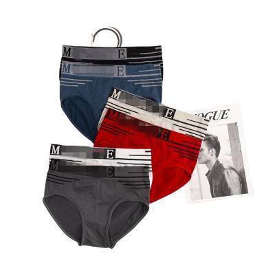 China Antibacterial Japanese Men's Underwear Seamless English Letter Sports Casual Shorts Stretch Medium Waist Panties Breathable Briefs for sale