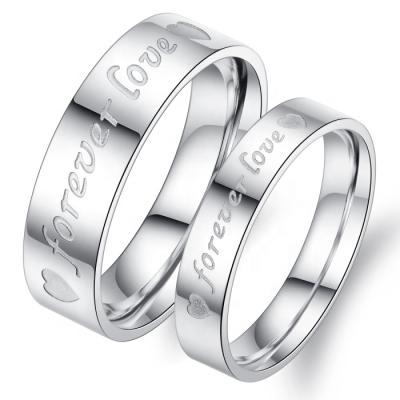 China Stainless Steel Minimalism Style “Love Forever” Deep Engrave Silver Color Stainless Steel Wholesale Love Knot Ring For Women Men for sale