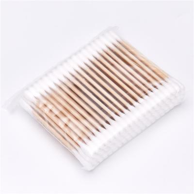 China 100pcs Yiwu Plant Wooden Cleaning Stick Cotton Buds Makeup Sterile Cotton Swabs for sale