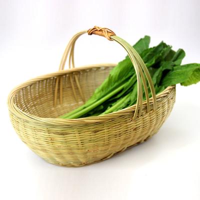 China Sustainable 100% Handwoven Bamboo Food Basket Used For Outdoor Storage Bamboo Weaving Basket With Handle for sale