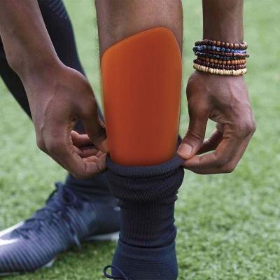 China Eco-friendly Football Accessories Motorcycle cycling protector Soccer Shin Guards With Non-newtonian Fluids for sale