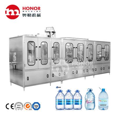 China Food Honor Machine Linear Type 1 One Gallon Bottle Water Liquid Filling Machine Line for sale