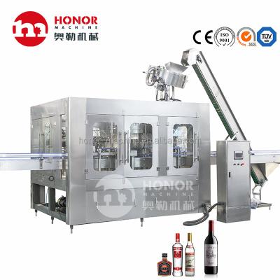 China Food honor machine glass bottle crown wine beer monoblock filling washing packing machine for sale