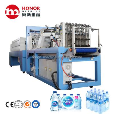 China Food PLC Control Semi-automatic PE Shrink Wrapping Packing Machine for sale