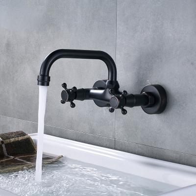 China Faucets GLOBE Brass Wall Mounted Basin Faucet Dual Metered Handles Dual Holes Hot Cold Bathroom Mixer Tap Sink Faucet 360 Rotation Spout for sale